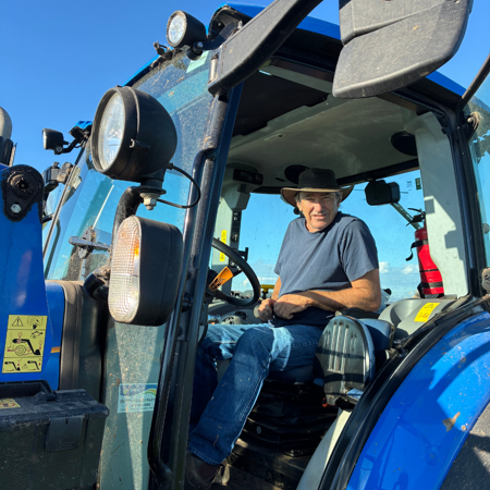 Bill Cleeland on a tractor